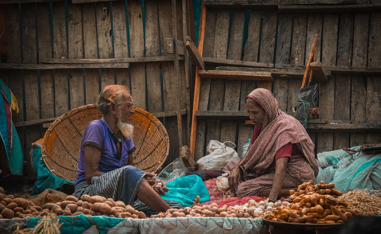 Farmer at a fresh produce market stall in India