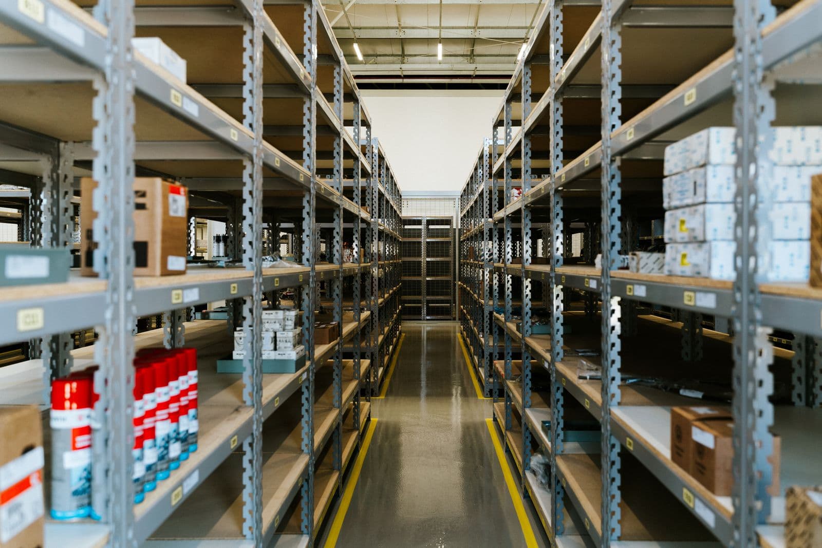 Warehouse stock and product boxes on shelves