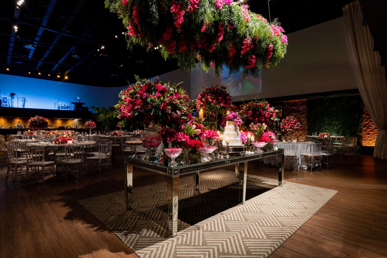Decorated table setup with flowers in a banquet hall