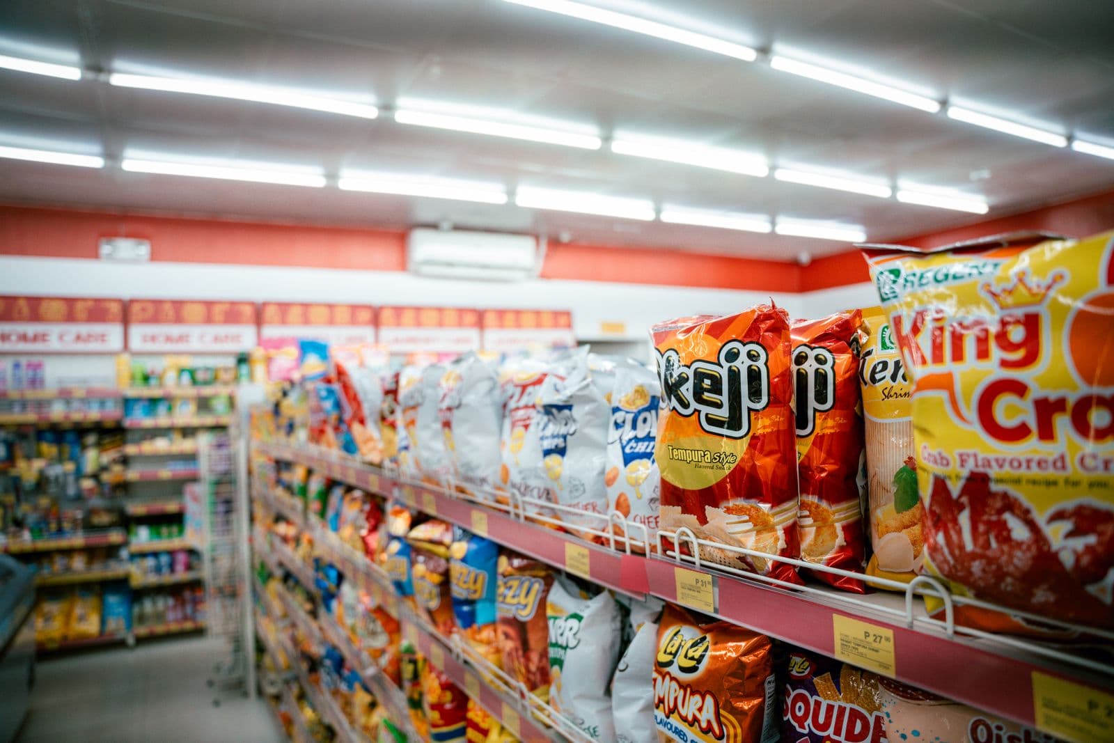 Grocery store shelves stocked with packaged products