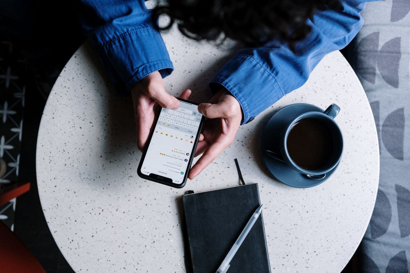 Customer browsing a jewellery catalogue of gold designs on a phone