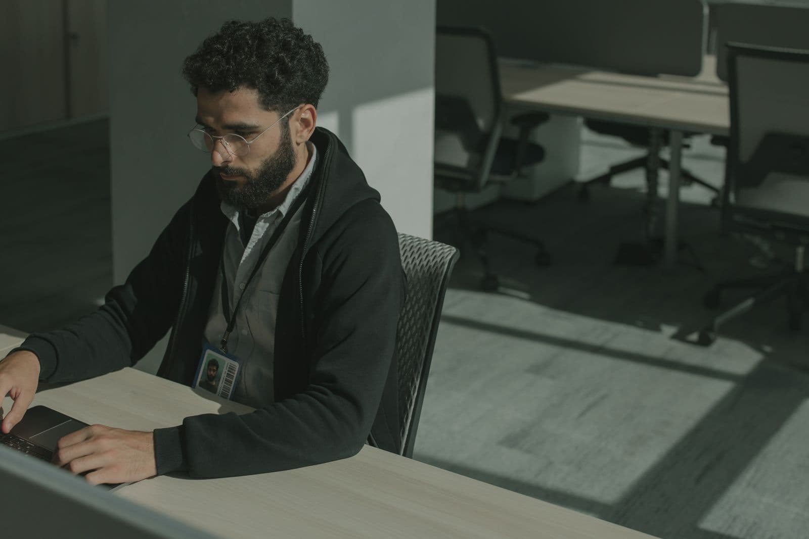 Professional working securely on a laptop in an office