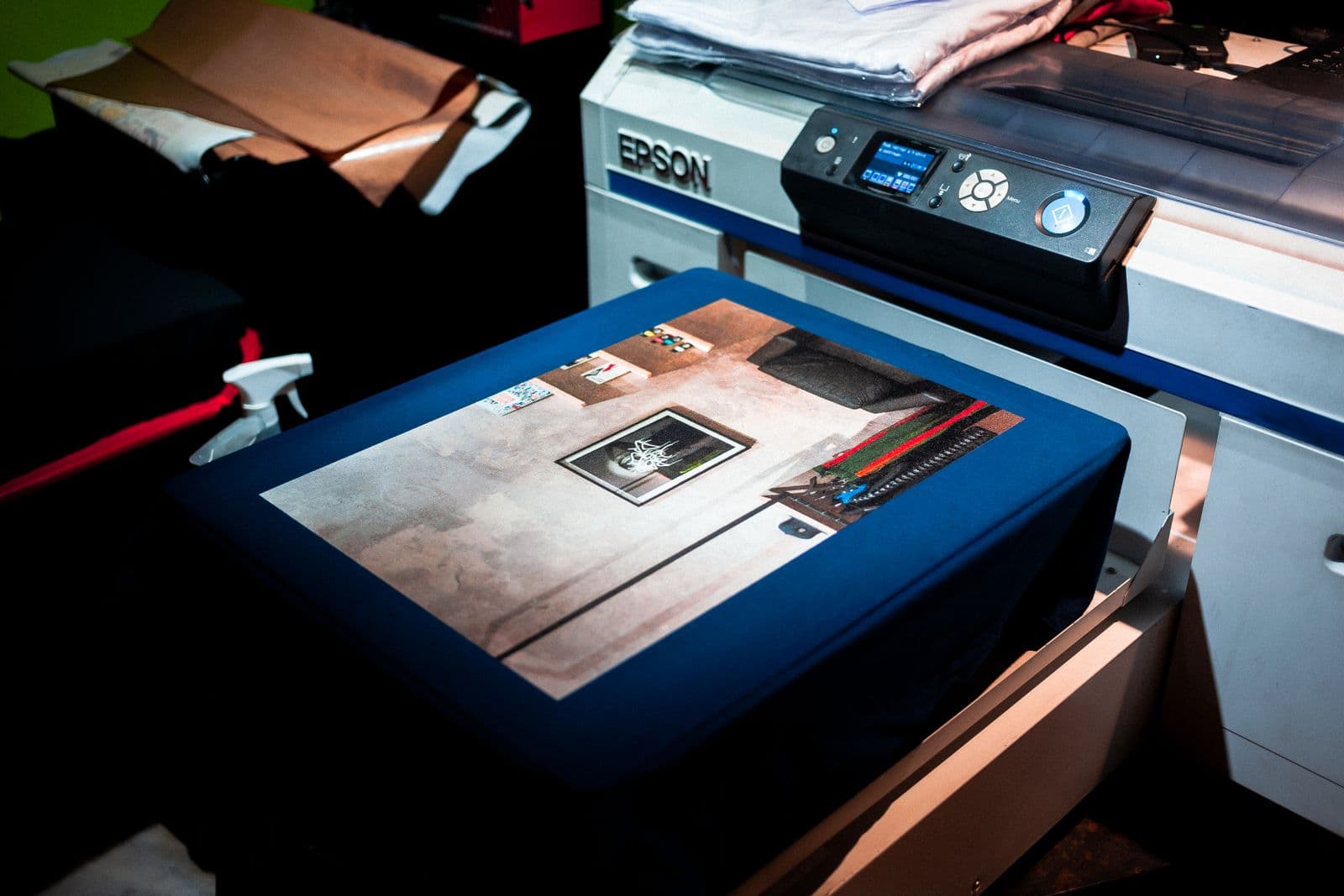Large-format digital printer running in a modern print shop