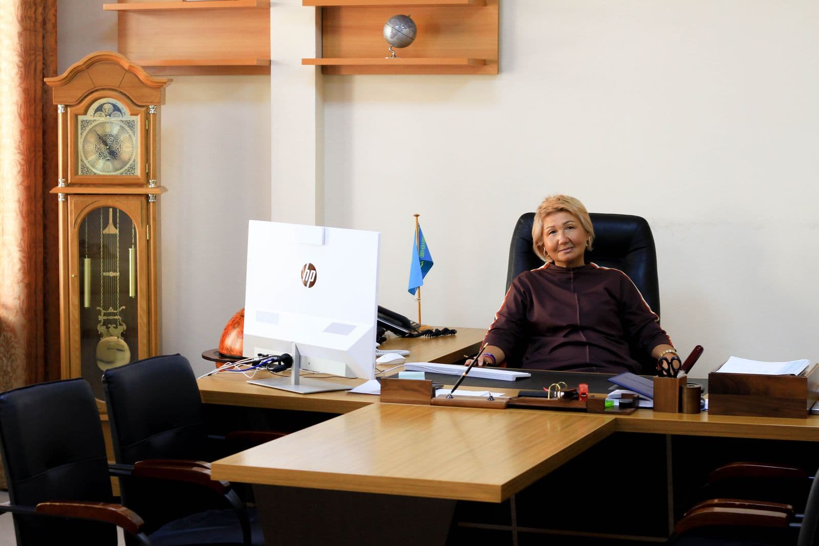 Modern school administration office with staff at a desk