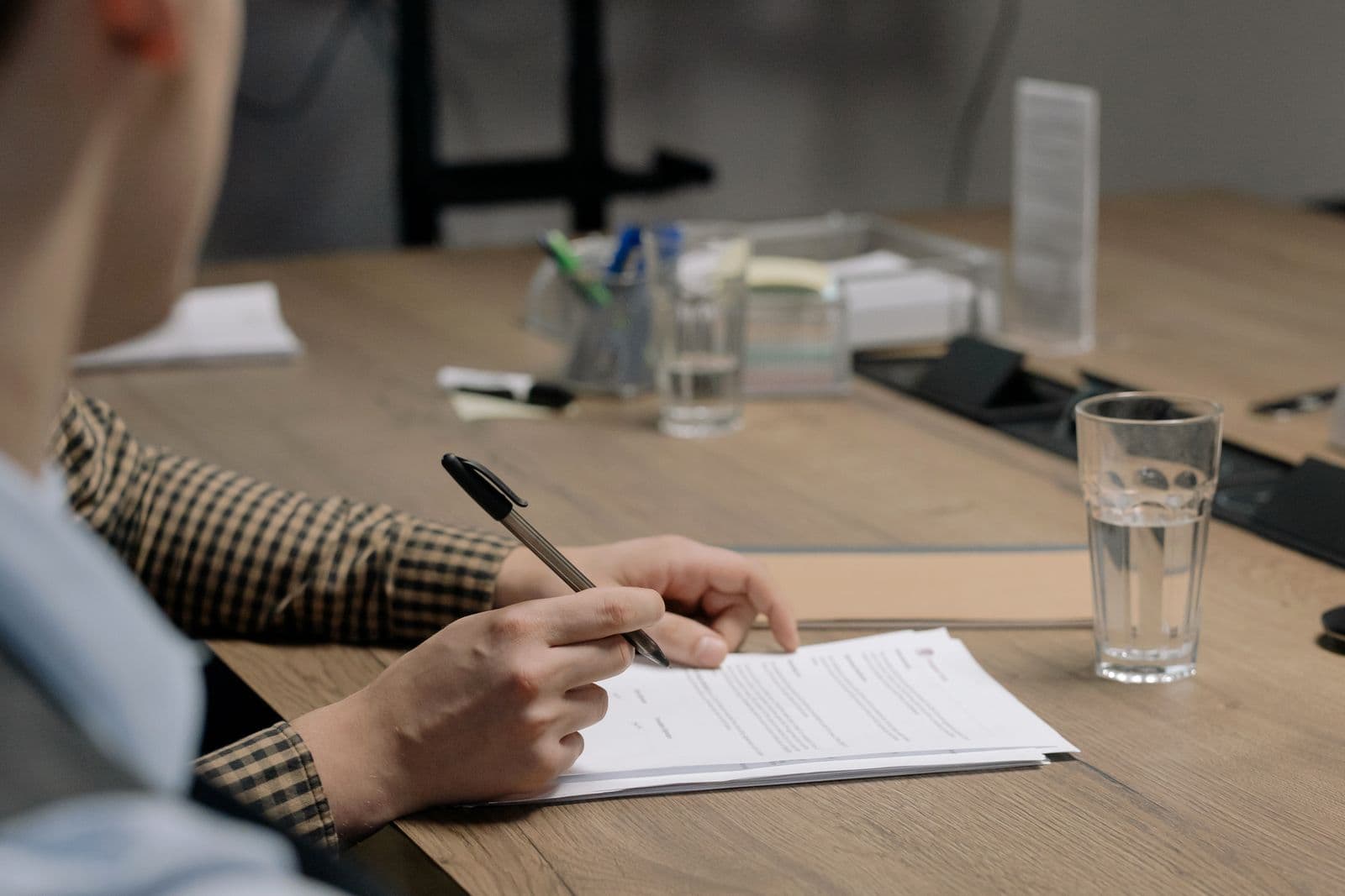 Signed business documents and contracts on a desk