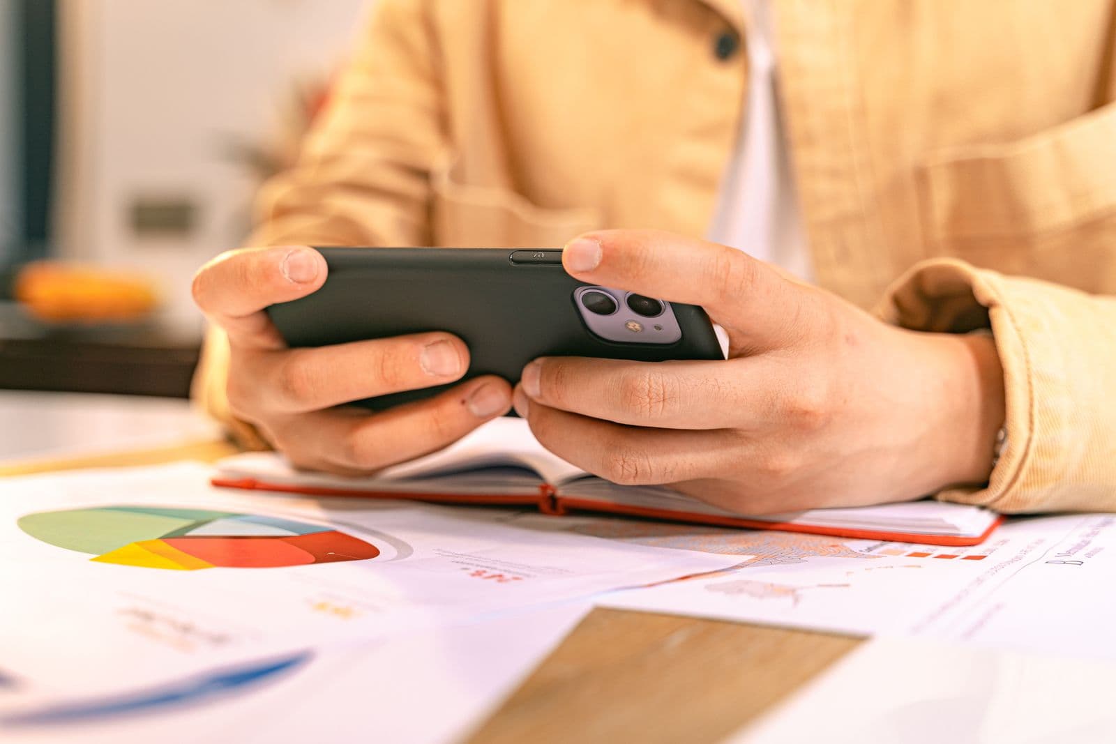 Person sharing documents on a smartphone