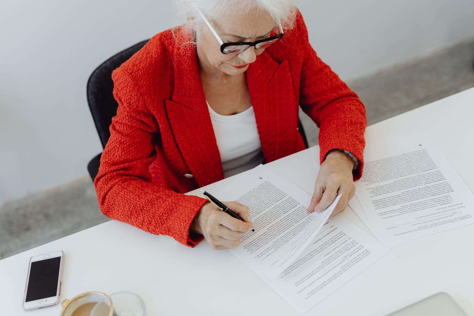 Signed agreement PDF with a watermark being exported on a phone