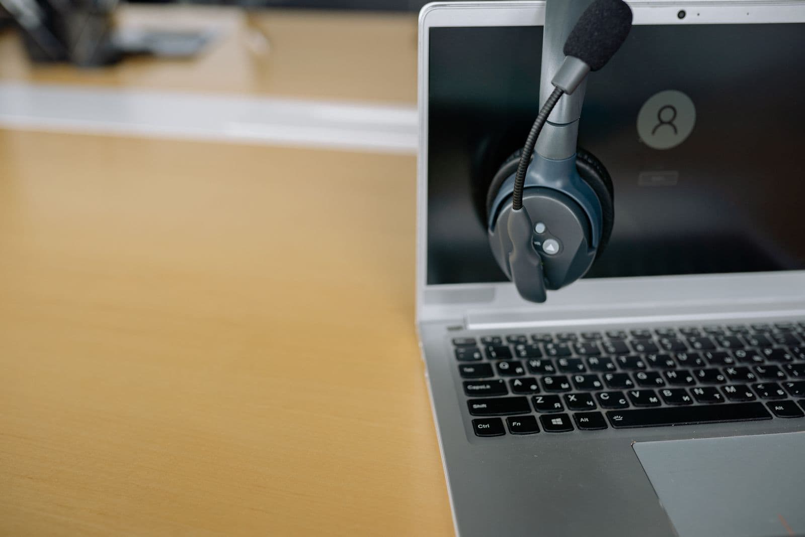 Customer profile records on a laptop screen in an office